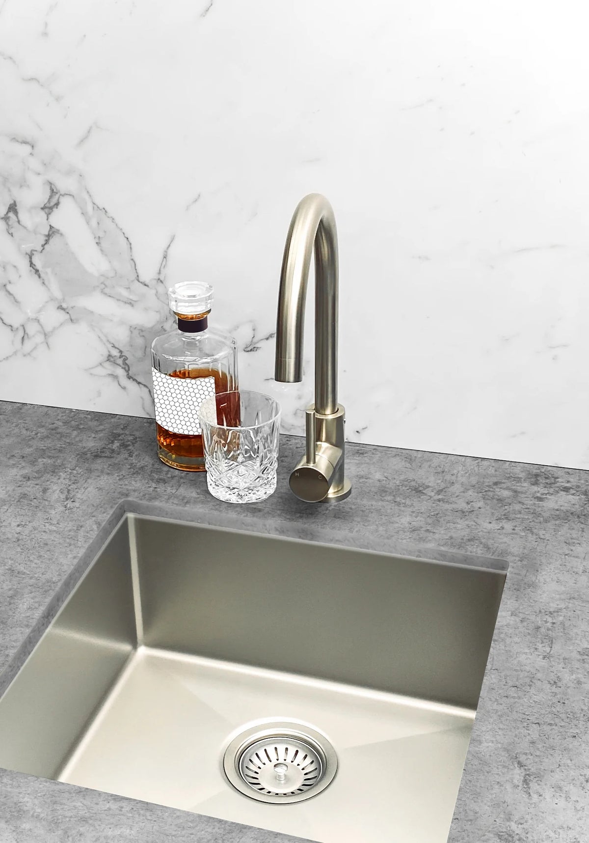 Butler sink and mixer installed in a light kitchen