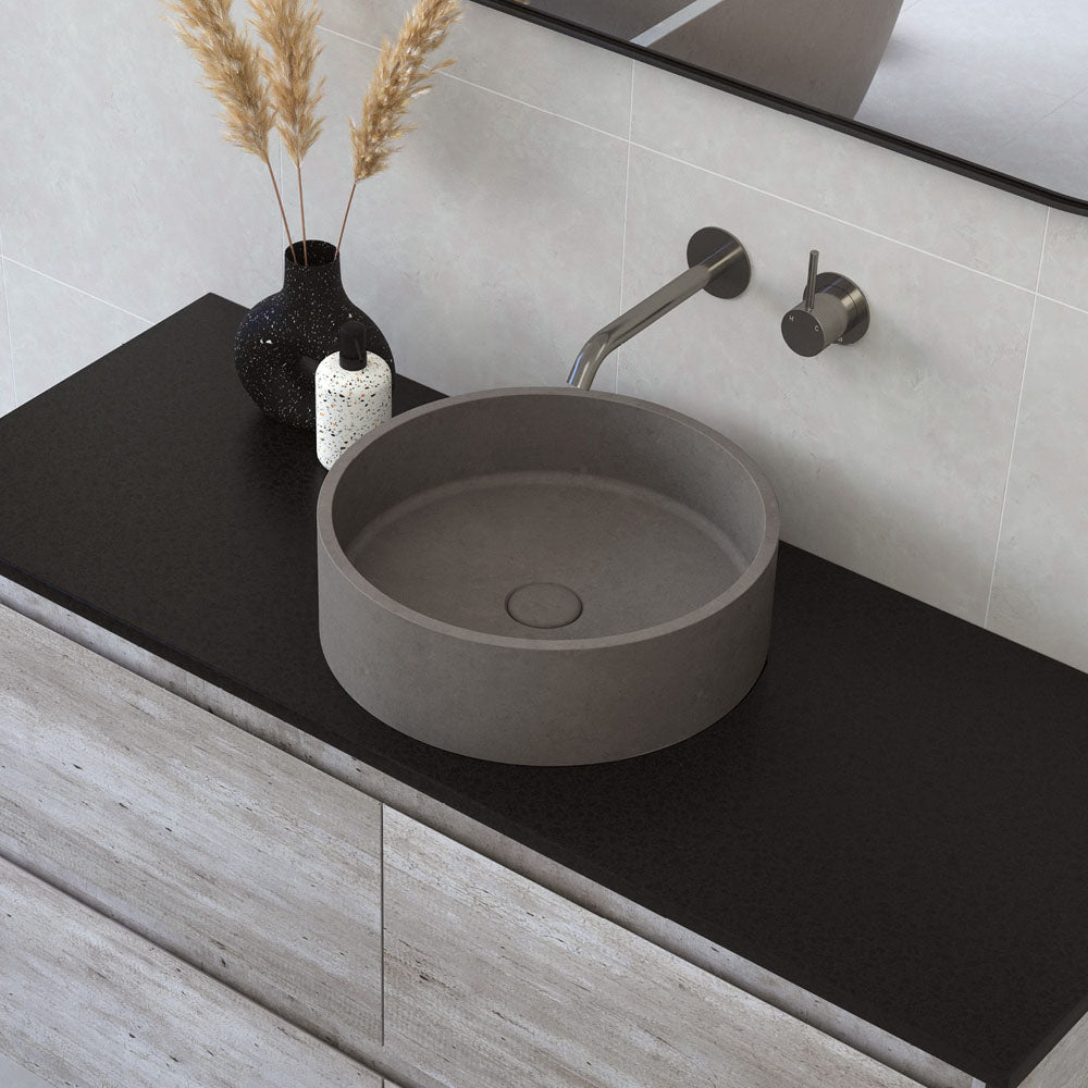 Fienza Jada warm grey concrete basin on a dark vanity
