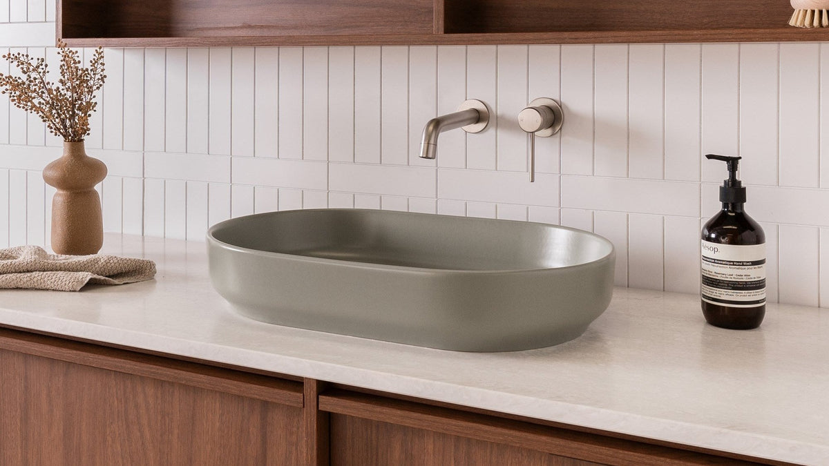 Countertop basin styled on a timber bathroom vanity
