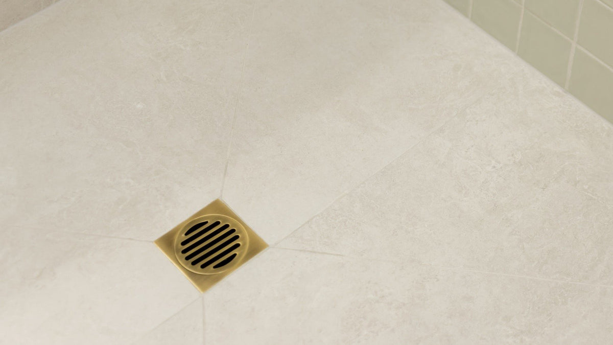 Floor waste fitted into a tiled shower floor