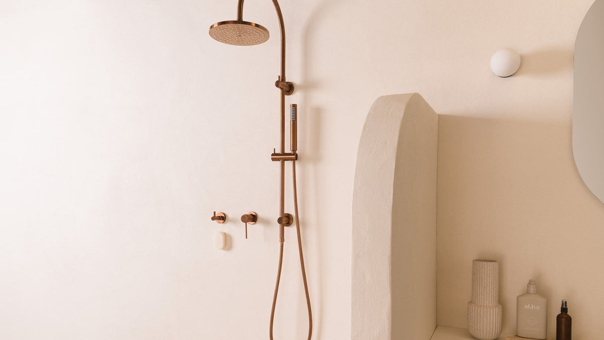 Shower fittings installed in a softly lit bathroom