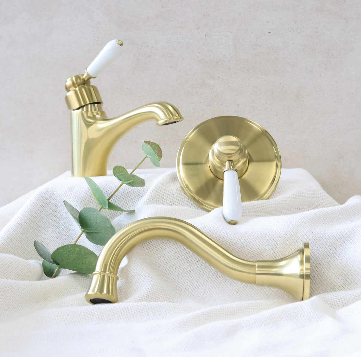 Modern National Bordeaux tapware with white lever handles on a linen backdrop