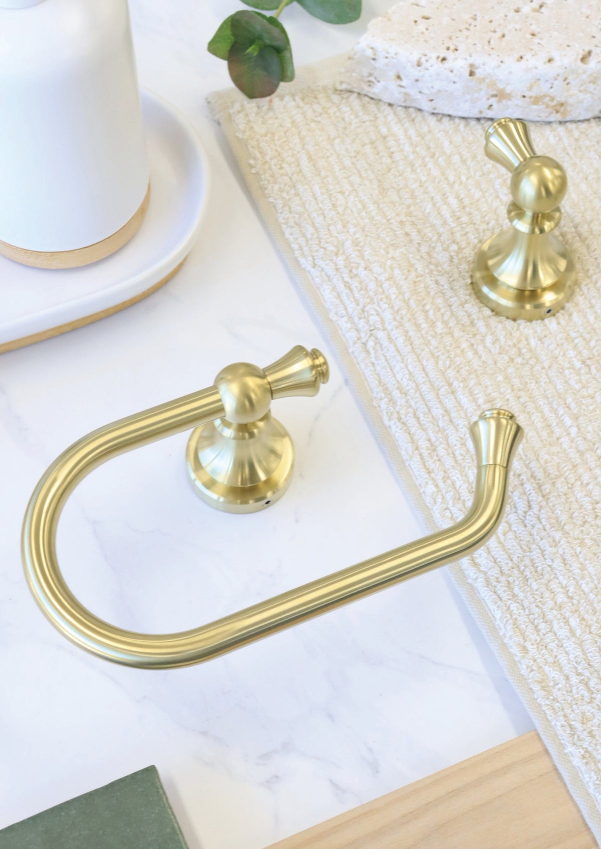 Modern National Medoc bathroom accessories styled with marble and linen