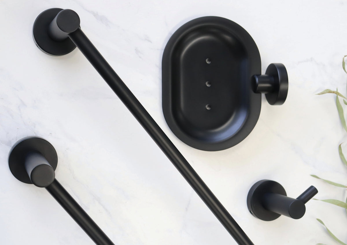 Modern National Mirage black bathroom accessories styled on marble